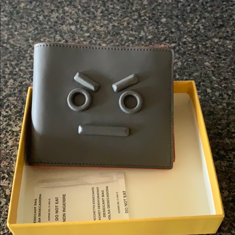 Brand new Fendi wallet with dust bag and box.
